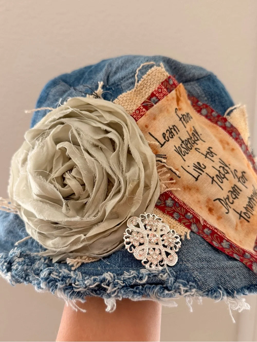New Denim Patchwork Bucket Hat with Beige Rosette Design by Blueberry Kate
